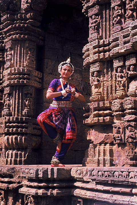 Odissi dancer at the carved temple
