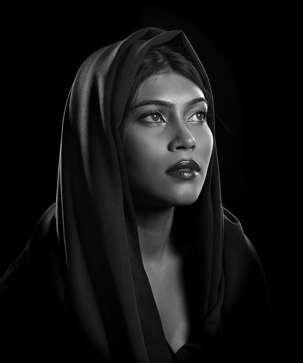Hooded shawl with upward gaze