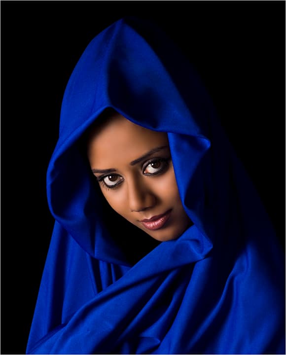 Sculptural cobalt hood